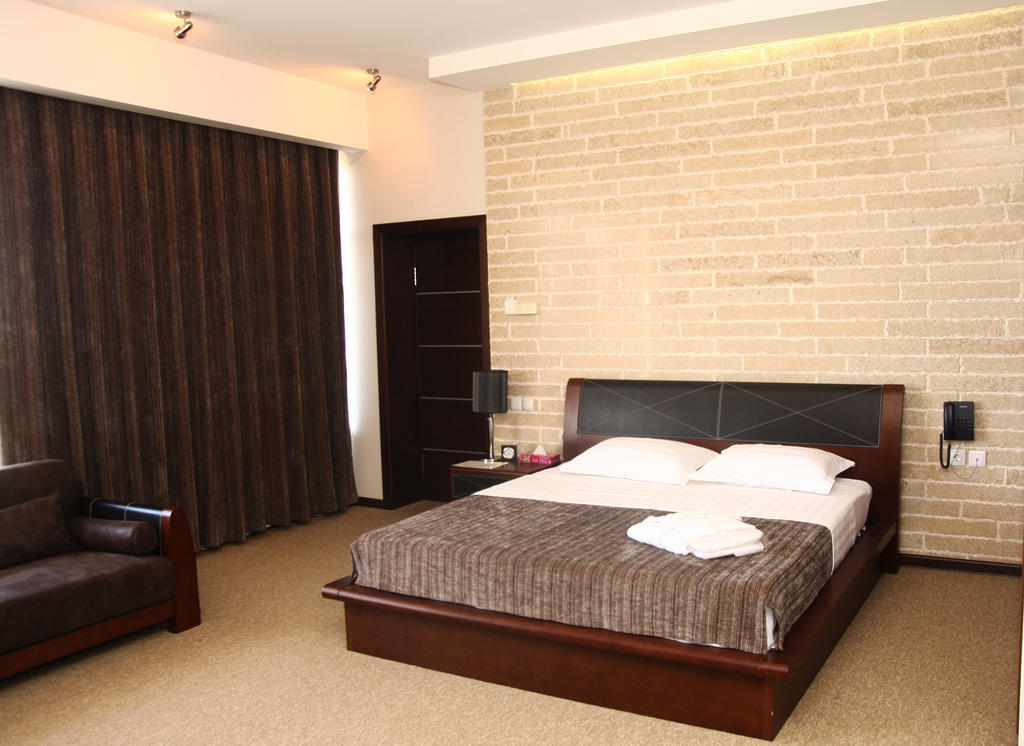 Grand M Hotel Navoï Chambre photo